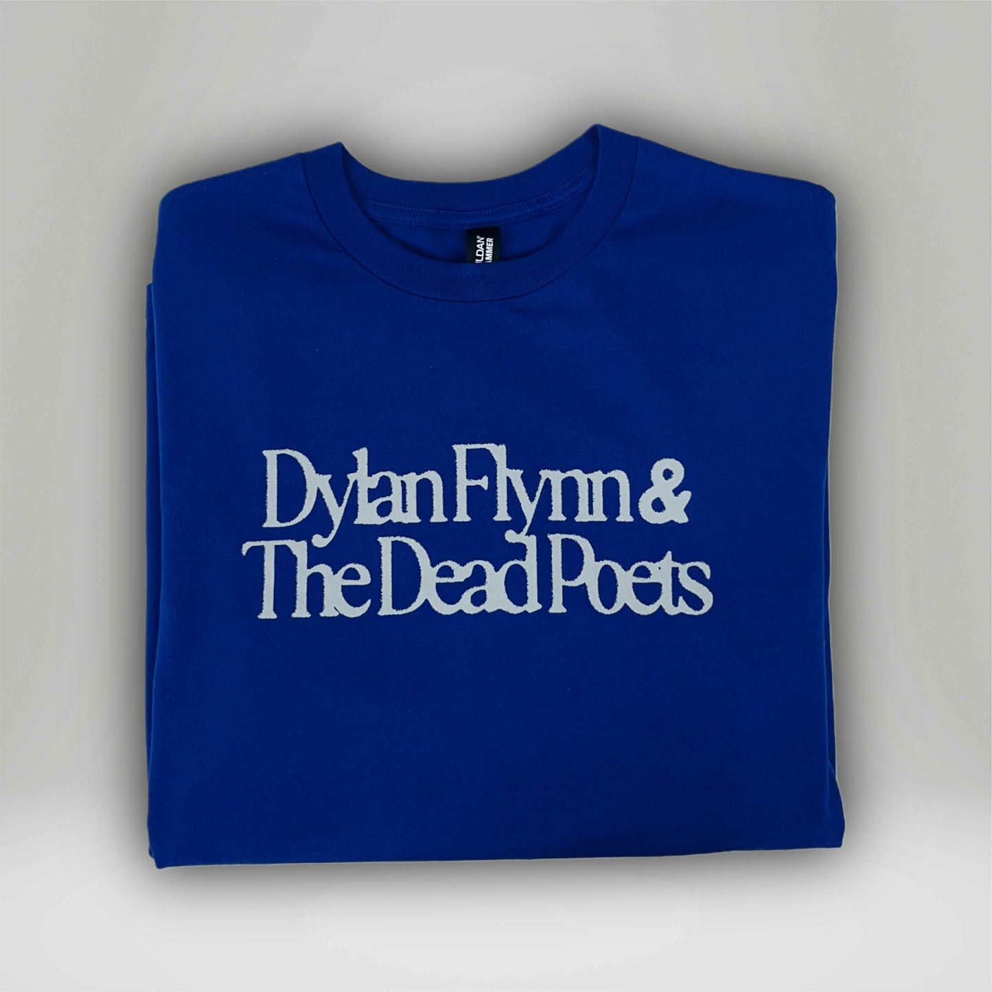 Blue T-shirt with white Dylan Flynn & The Dead Poets logo