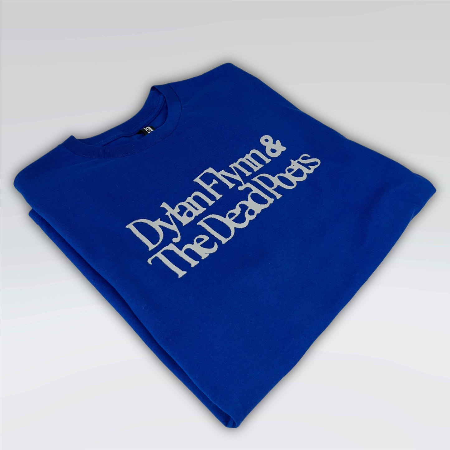 Blue T-shirt with white Dylan Flynn & The Dead Poets logo